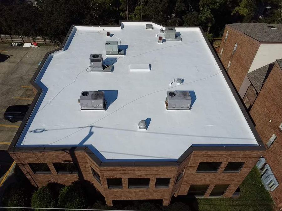 Aerial view of a completed commercial roof replacement