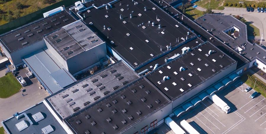 Aerial view of a completed commercial EPDM roof system